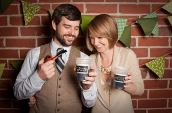 short haired bride enjoys a drink with her groom