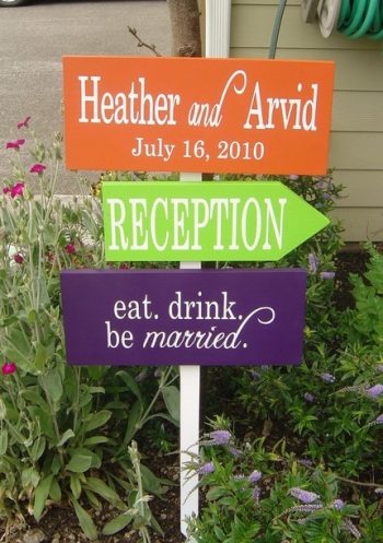 orange green and purple handmade wedding signs