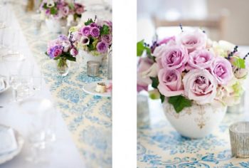 Blue damask table runner and pink rose centerpieces