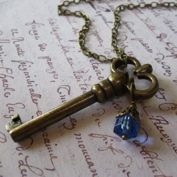 Skeleton key with blue bead
