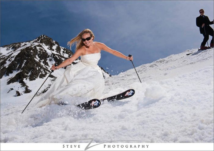 bride skis down steep slope
