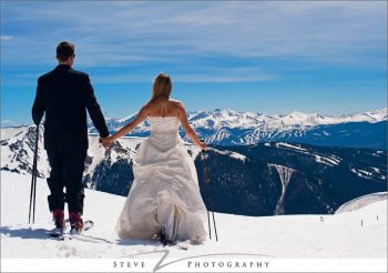 bride and groom on top of the mountain