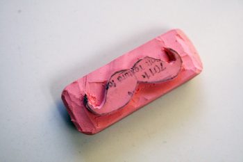 DIY stamp cut out of a mustache on an eraser