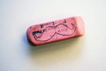DIY eraser stamp with a mustache drawn on it