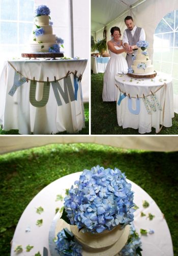wedding cake topped with blue hydrangea