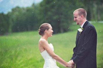 Bride and Groom in a mountain meadow