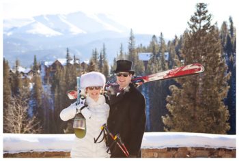 bride and groom holding skis