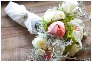 white and pink rose with baby's breath bouquet