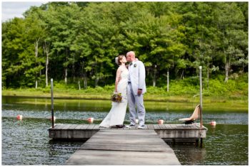 western maryland bride and groom kiis by a lake