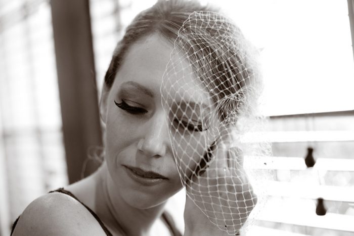 Bride in a birdcage veil