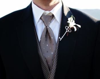 Cala lily boutonniere with vintage key