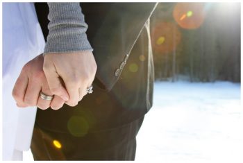 bride and groom hold hands at Big Bear