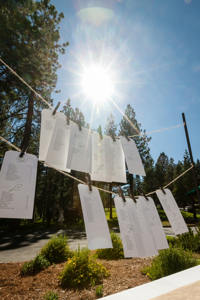 escort cards pinned to clothes line