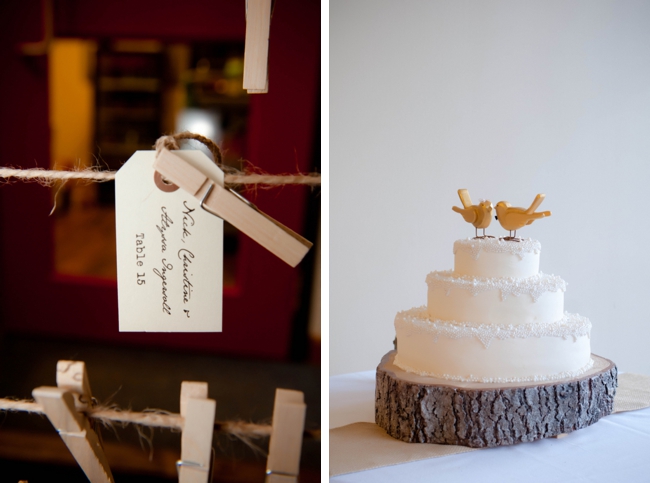 rustic wedding cake with wooden round and bird topper
