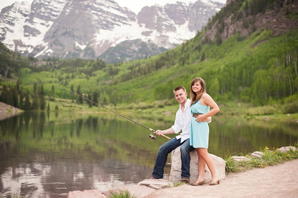 aspen engagement couple standing by a lake