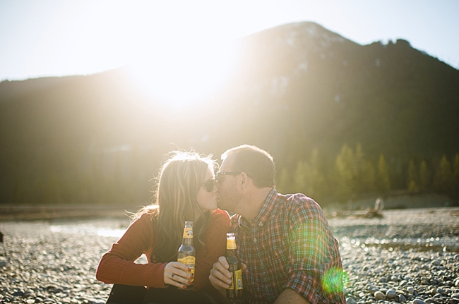 sunset kiss British columbia mountain engagement shoot by Nordica Photography