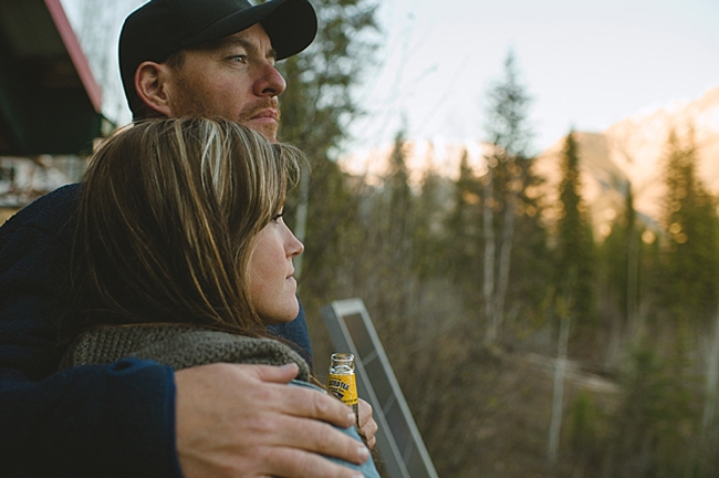 back at the cabin sunset kiss British columbia mountain engagement shoot by Nordica Photography
