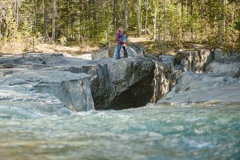 River at a British columbia mountain engagement shoot by Nordica Photography