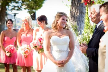 smiling bride at ceremony Tahoe Wedding via https://mountainsidebride.com