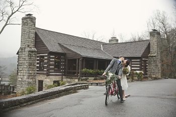 winter bride and groom on vintage bike