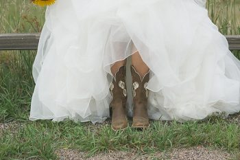 bride in boots | Colorado Wedding