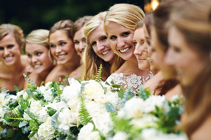 bridesmaids with white bouquets