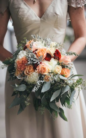 Gorgeous peachy and green wedding bouquet