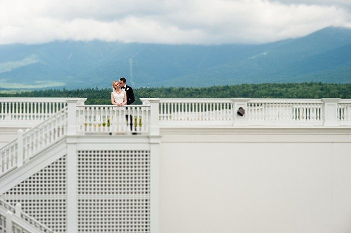 bride and groom on the deck | Photography by AMW Studios | see more on MountainsideBride.com