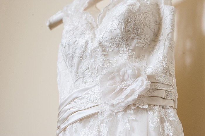pretty wedding dress with fabric flower belt| Photography by AMW Studios | see more on MountainsideBride.com