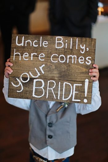 8a-Devils-Thumb-Ranch-wedding-Becky-Young Photography-ringbearer-sign