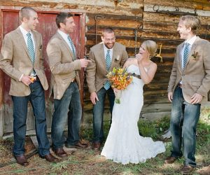 bride with groomsmen | steamboat springs wedding | Andy Barnhart