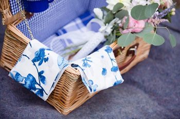 picnic basket | boutonniere | Watercolor Wedding Inspiration | Nordic Center Breckenridge Colorado | Sarah Roshan Wedding Photographer