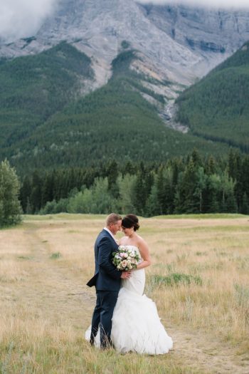 Bride And Groom Canmore Mountain Wedding At Silvertip Resort Corrina Walker Photography | Via MountainsideBride.com