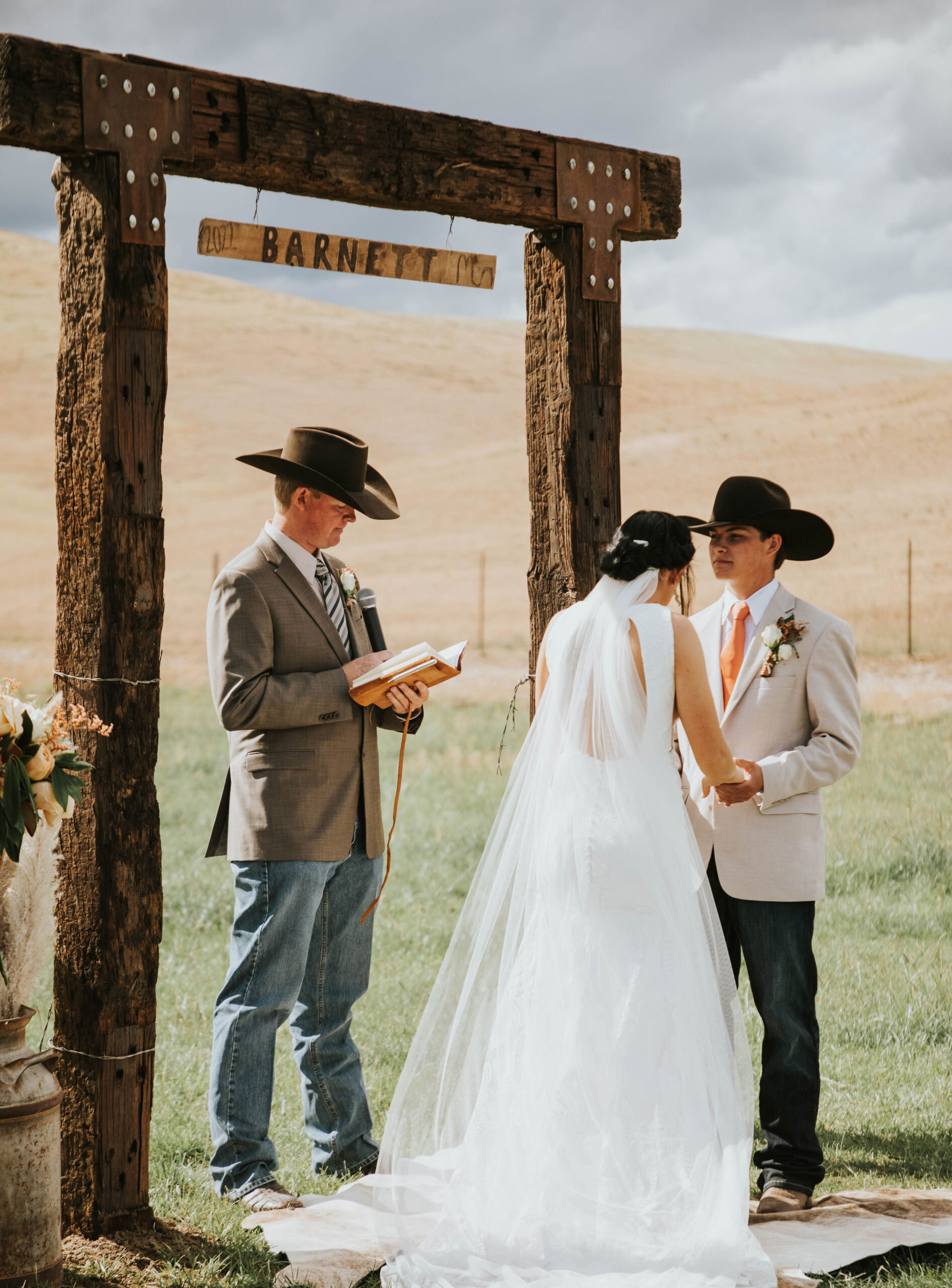 bride and groom at the alter in a rustic mountain wedding